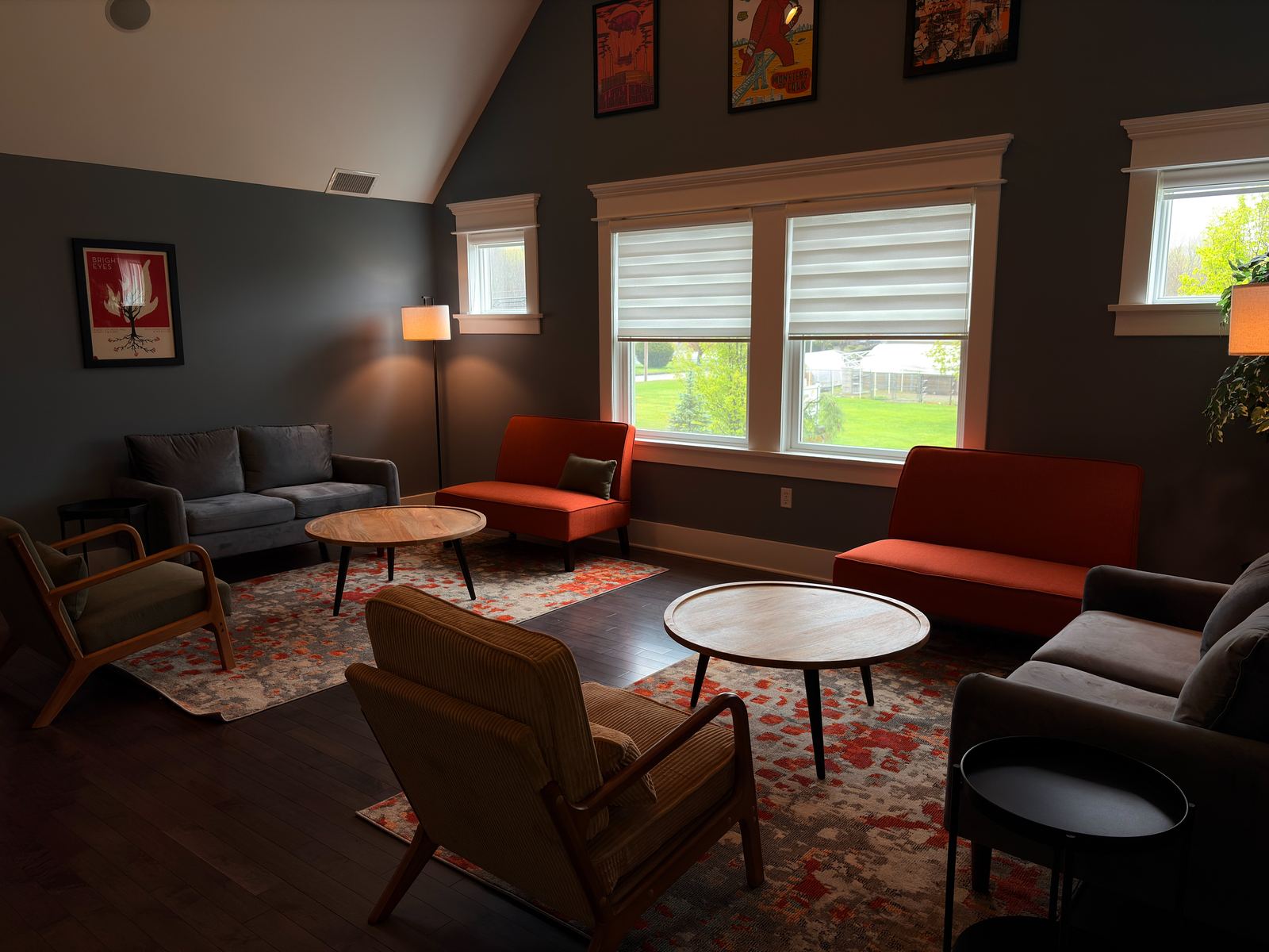 Orange lounge chairs by the windows