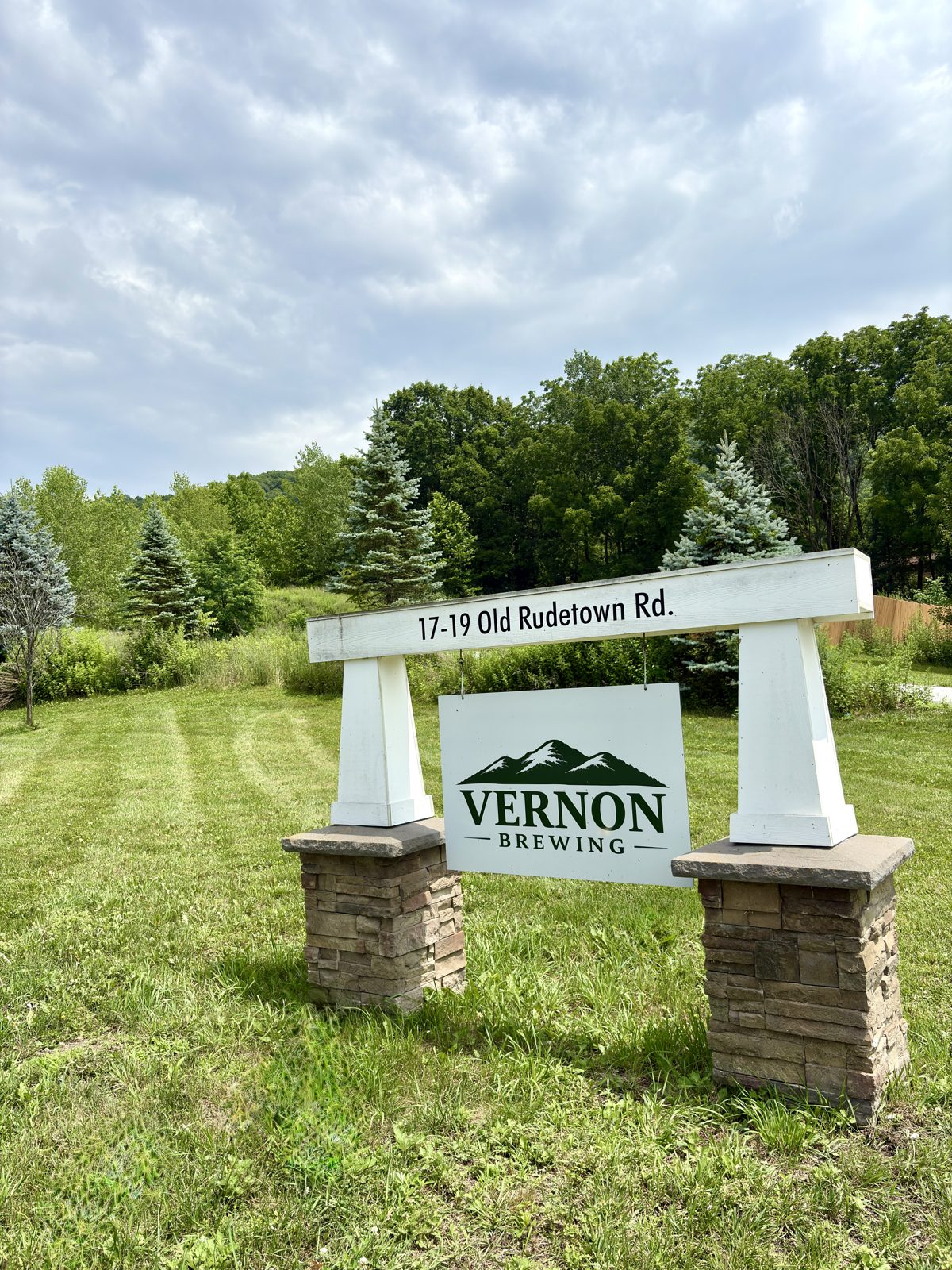 The Vernon Brewing sign at the road